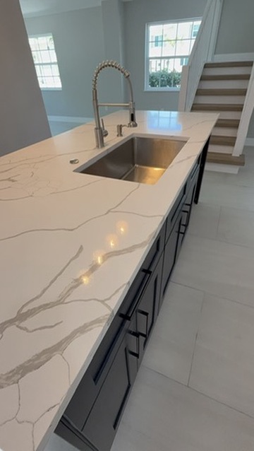 Frameless glass marble shower by Premier Magnolia Homes