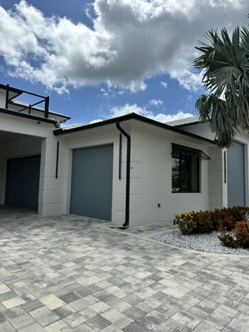 Custom coastal home exterior in Southwest Florida by Premier Magnolia Homes