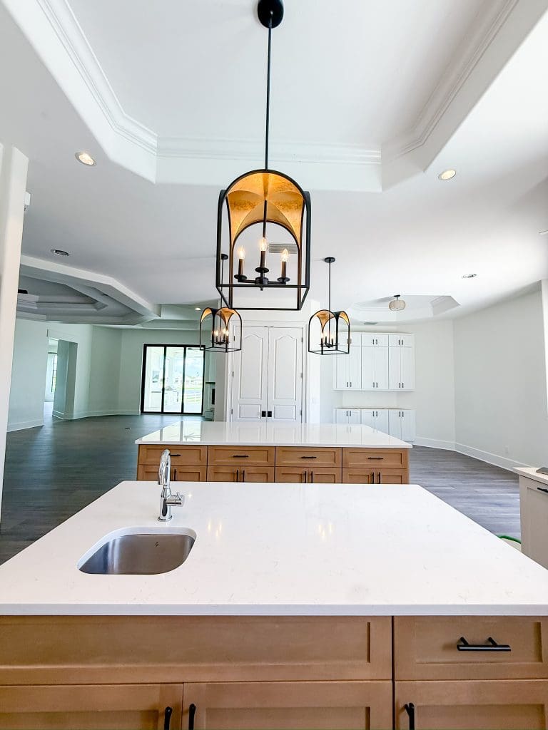 Renovated kitchen open to the great room in a Bonita Springs golf community home