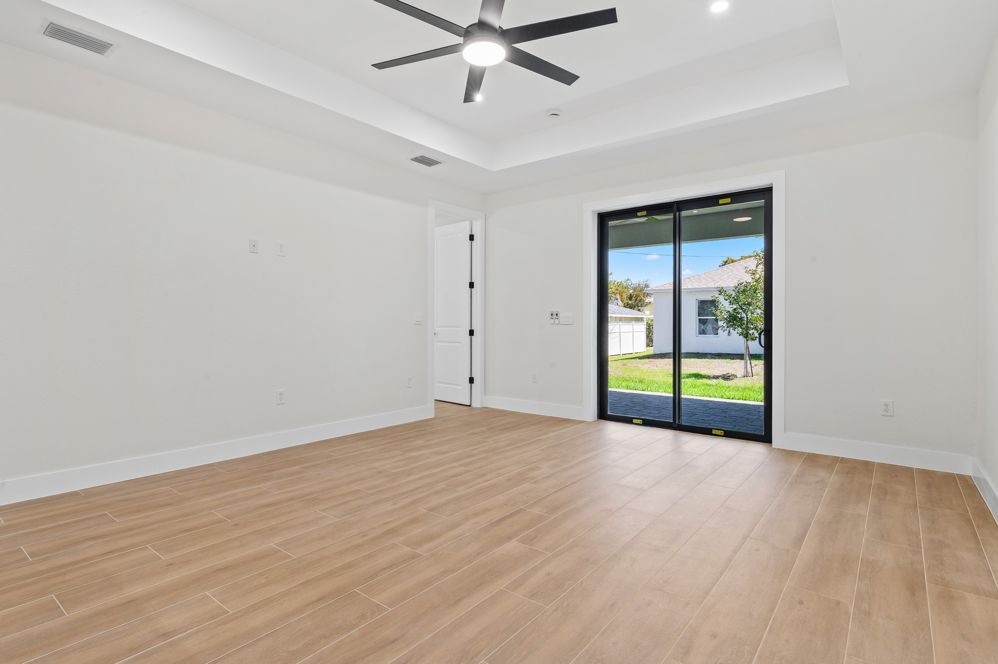Bedroom with sliding glass door