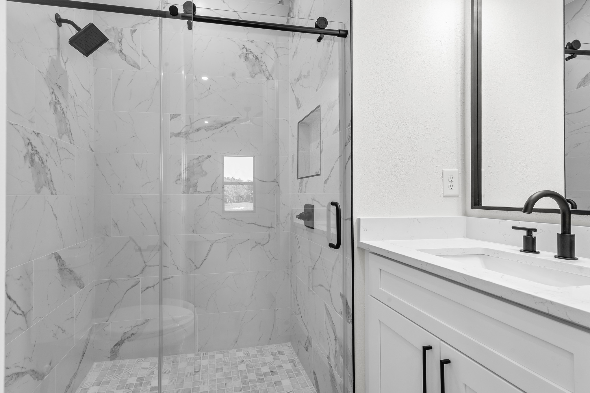 Marble tile bathroom sliding glass shower