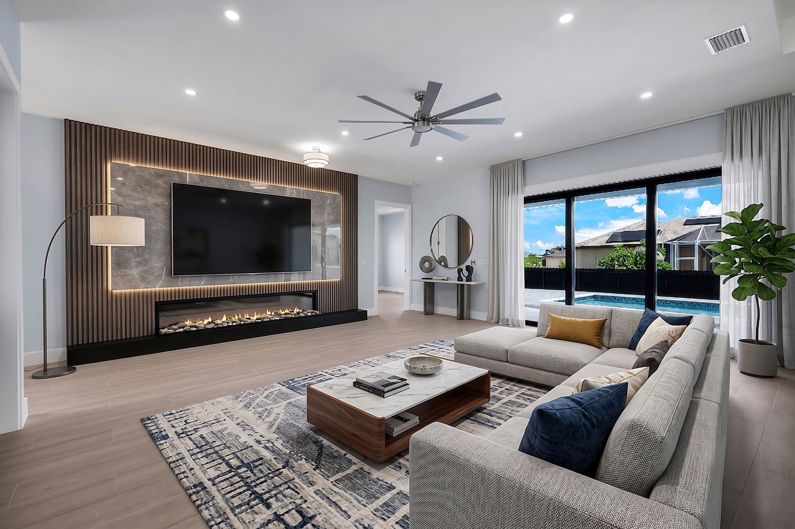 Oikos living room with fireplace wall
