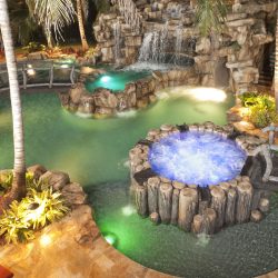 outdoor pool with landscaping